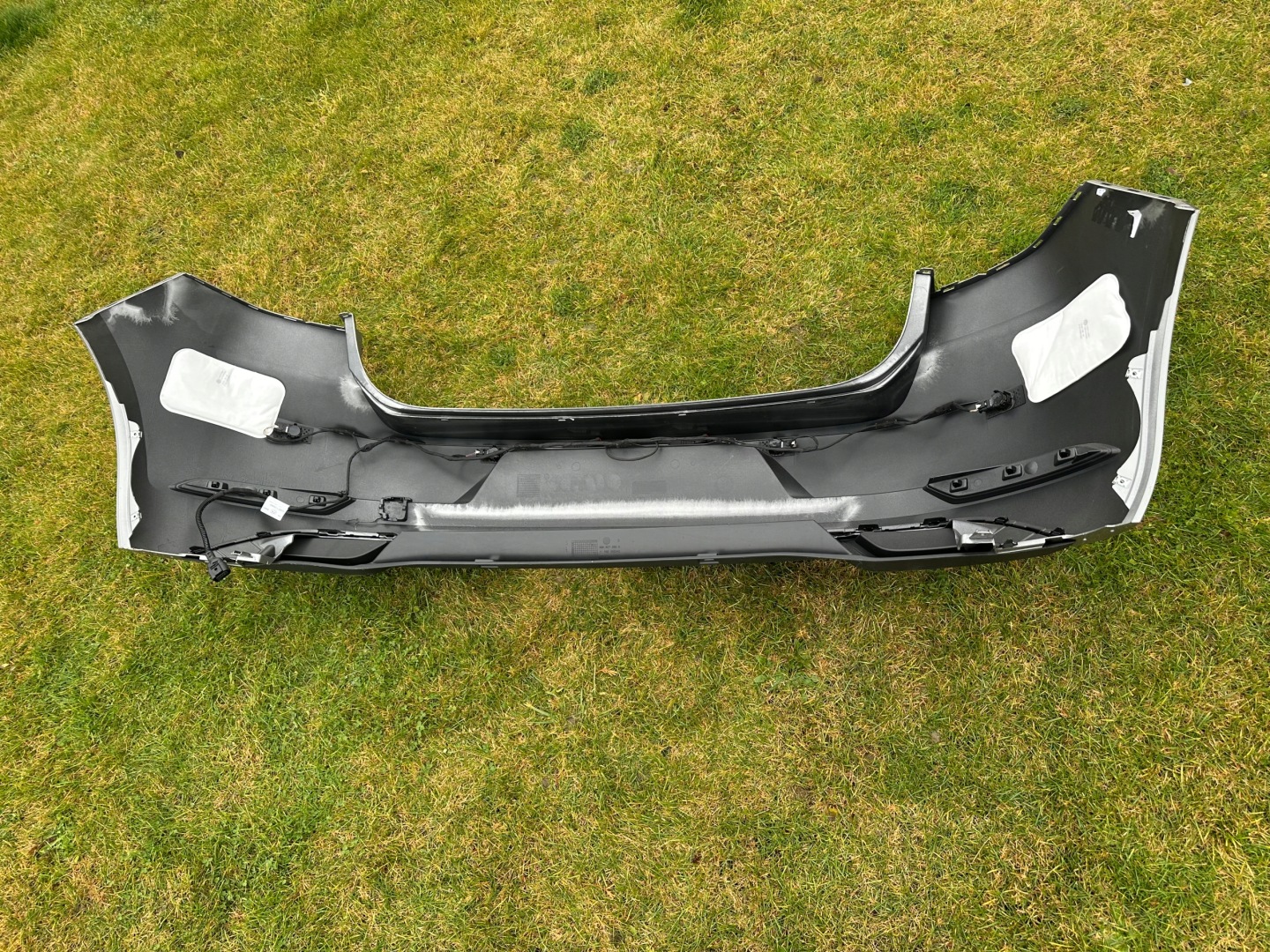 Gebrauchte VW Golf 7 Facelift Heckstoßstange mit 4 PDC-Sensoren und Teilenummer 5G6807421BK